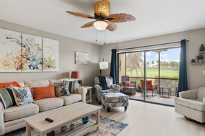 Lovely yet comfy and cozy living room with a view of the golf course