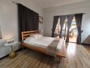 Queen size bed with side tables and wireless phone charger clock/radio B/T 