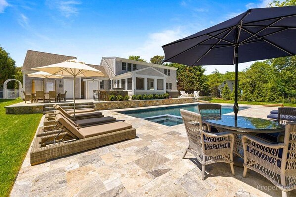 Gorgeous, custom built home with heated pool and two hot tubs!