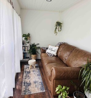 Grab a book and curl up in our cozy sunroom.