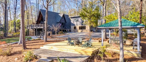 Patio w/ gazebo, grill, dining table & 4 Adirondacks