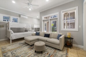 Bunkroom with full bath and living area