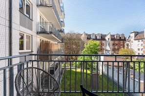 The balcony is an ideal place to unwind after a busy day.