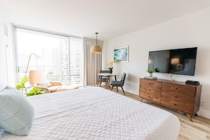 Our city-view room with a spacious queen bed and cable TV