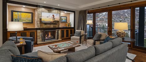 Great room with fireplace and views