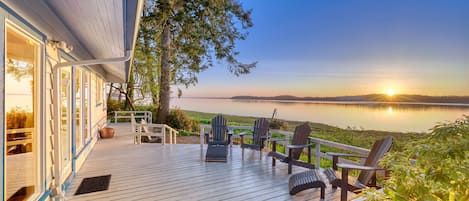 Experience beautiful sunrises on the back deck while enjoying your morning cup of coffee.