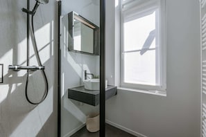 First bathroom with walk-in shower