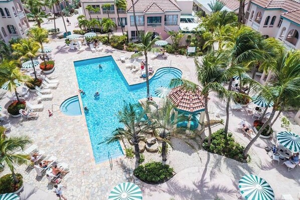 The North Pool offers plenty of tables, umbrellas and natural shade too!