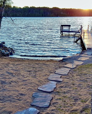 Sand beach, sunsets, and the crystal clear water of beautiful Thunder Lake!