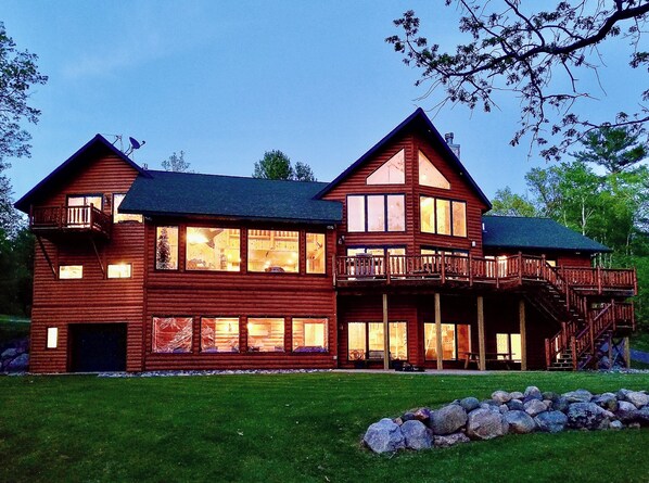 Lakeside view - all lake level living overlooking huge yard and sand beach!