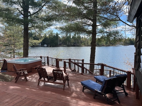 Large deck area with hot tub