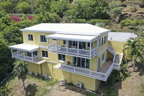 Back of home. Bottom right side of home is apartment entrance and balcony