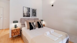Enjoy a peaceful night's sleep in this charming bedroom area featuring a comfortable mattress. #airbnb #bed