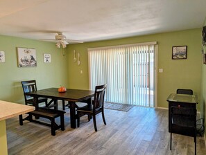 Diningroom area with entrance to backyard patio