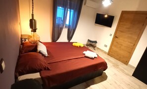 Room 1, with Queen Size double bed Air Condition, TV Internet, private bathroom
