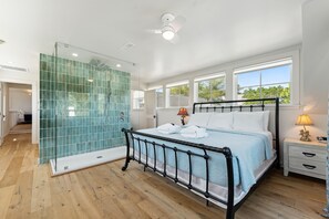 Main bedroom upstairs with King bed and ensuite bathroom.