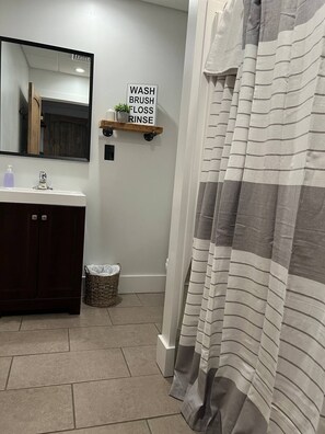 Shower only - there is no bathtub.