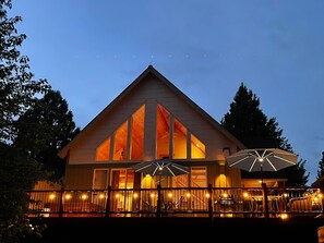 Deck with propane grill and hot tub, solar umbrella lights