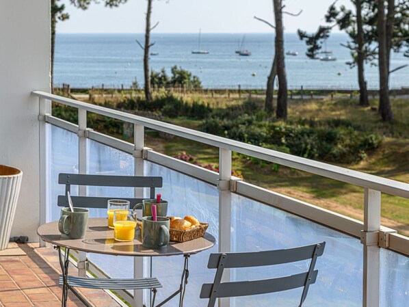 Water, Plant, Table, Property, Furniture, Sky, Chair, Outdoor Furniture, Shade, Tree