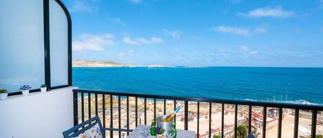 Balcony with table and chairs