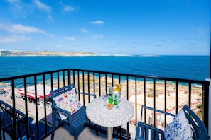 Balcony with table and chairs