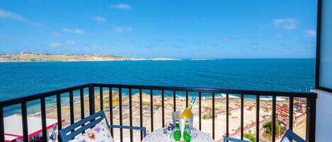 Balcony with table and chairs