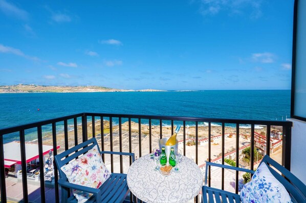 Balcony with table and chairs