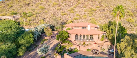 Large lot with desert mountains as a backdrop.