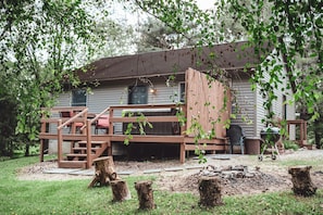 Enjoy a private outdoor fire pit, patio, and hot tub.