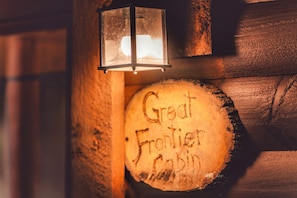 The Great Frontier signage as you enter the front of the cabin