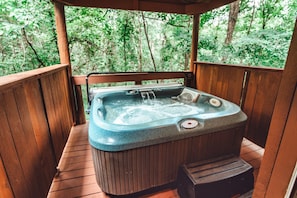 Relax & unwind in this private hot tub