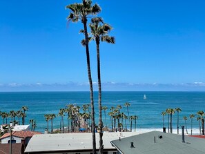 Endless blue from our patio view: Relaxation redefined.