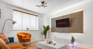 Living room - Sofa Bed - 43' Smart TV loaded with Netflix, ambient lighting & extra fast wifi - Complimentary tea & coffee available for your enjoyment