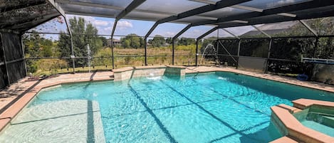 XL Pool with Hot Tub and Fountain. Partial Privacy of side Neighbors, No Rear Neighbors. Conservation Lake View