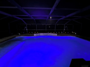 Pool at night with color changing lights