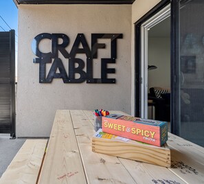 Custom Steel Sign Made in Alberta. Guests are invited to Draw and Sign the Table, Play Games or Enjoy the Views 