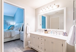 Double-sink bathroom with large, well-lit mirror enables you to look your best 