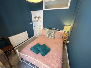 Double bed in second floor apartment