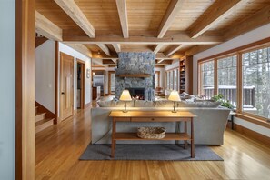 Beautiful Stone Fireplace is the Focal Point of the Room