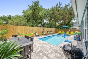Dine Al Fresco! Take a break from the pool and gather your family around the outdoor 8-seat dining table for a memorable meal.