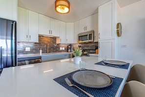 Beautifully updated kitchen with stone island