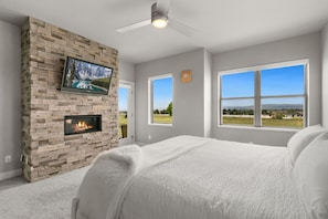 Bedroom 1 | King Bed with Fireplace, Smart TV and Walk-out Patio (main level)