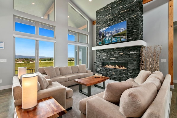 Cozy Living Area with Vaulted Ceilings | Smart TV, Fireplace and tons of comfortable seating!