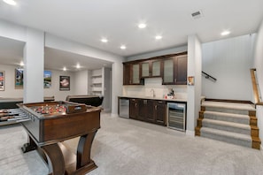 Media Game Room | Wet Bar, Foosball Table and Smart TV (basement level)