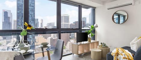 A tastefully furnished living area with city views.