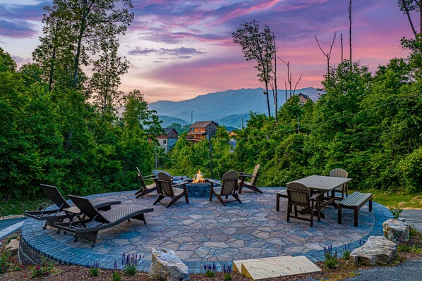 Outdoor space with a view, firepit, picnic table, & lounge chair