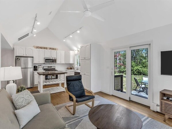 Welcome To The Deepwood. The main living area of this home exudes warmth and welcome.