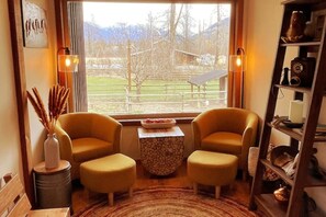 Inviting entrance lounge to enjoy a cup of tea, read a book, or watch chickens?
