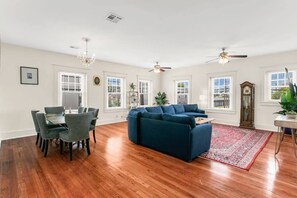 Massive, open, living and dining room.