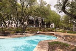 Relax and Refresh in the pool, steps from the front door.